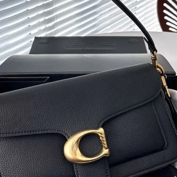 Customer received Coach bag 2
