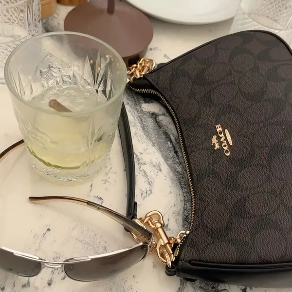 Customer received Coach bag 6